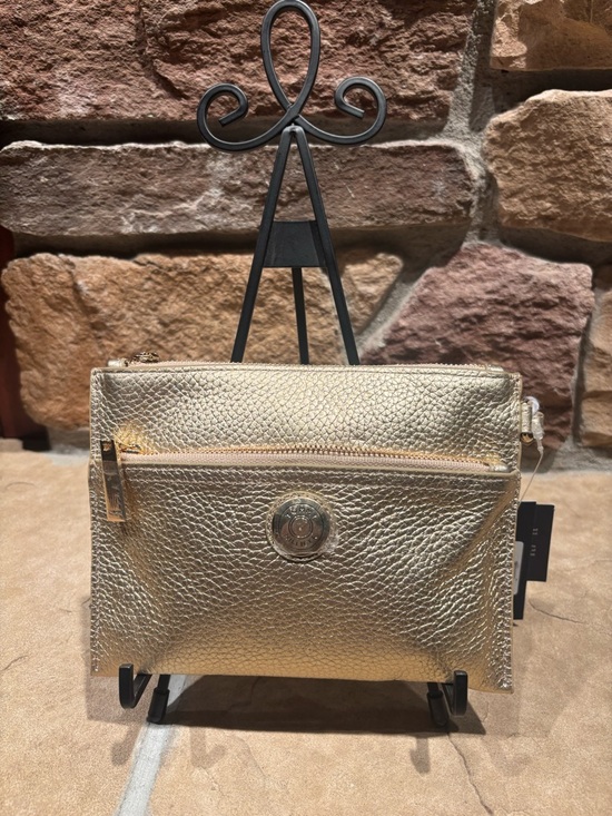 Tommy Hilfiger Handbags - NWT Tommy Hilfiger Metallic Gold Leather Wristlet Clutch